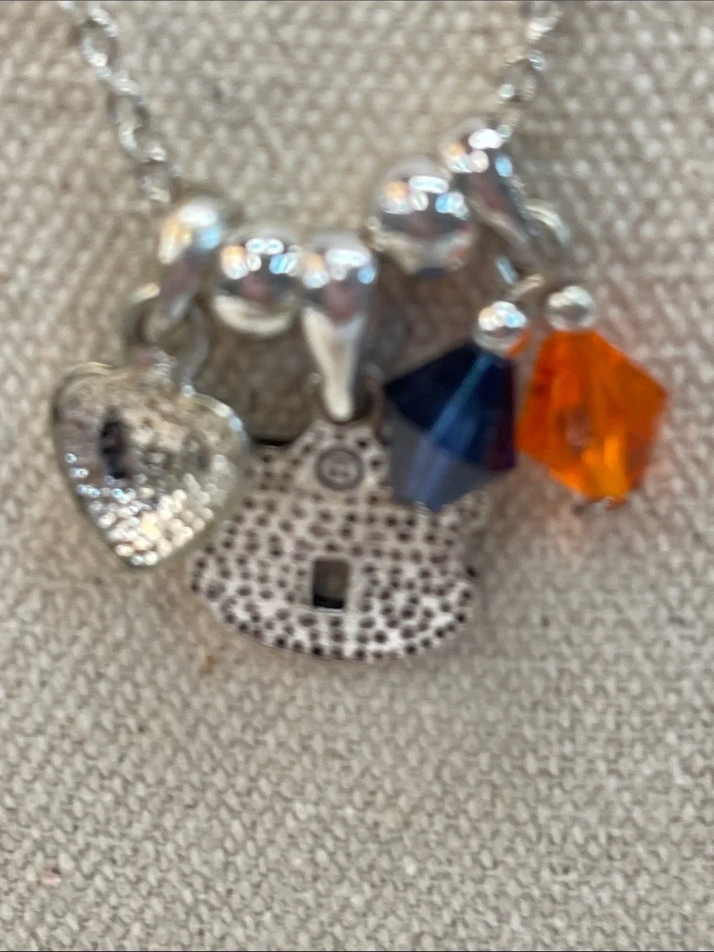 Auburn collegiate silver necklace with AU pendant in blue and orange